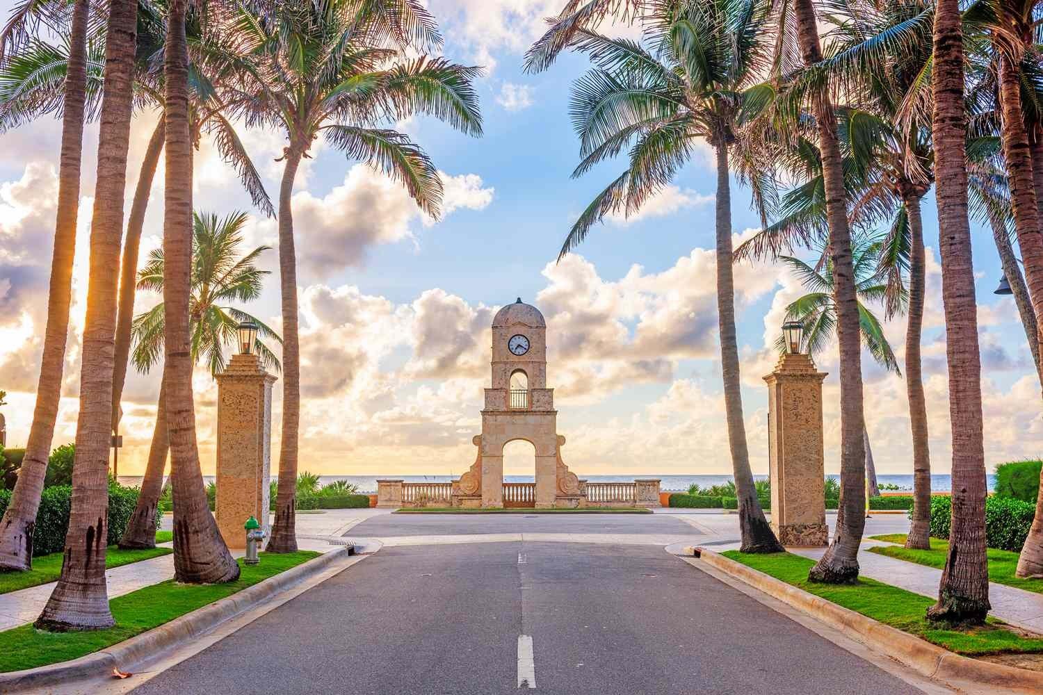 The Worth Avenue clock tower framed by palms at golden hour, Palm Beach